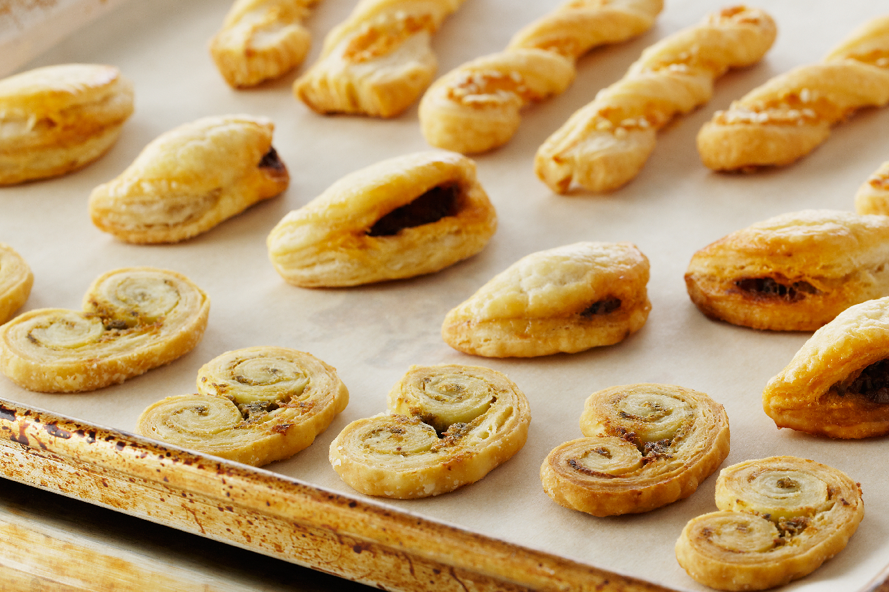 Anna Olson's savoury hors douevres in three different varieties on a baking tray