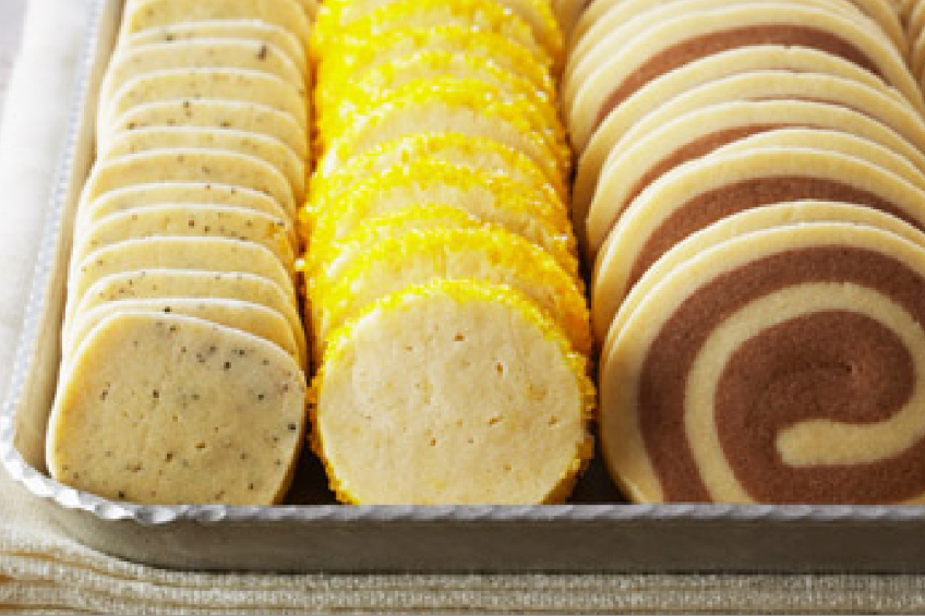 Anna Olson's icebox cookies: lemon poppyside, sugar cookie with granulated icing sugar and chocolate pinwheel cookies