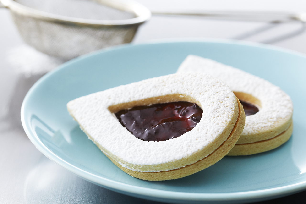 Anna Olson's teardrop shaped and icing sugar-dusted almond linzer sandwich cookies