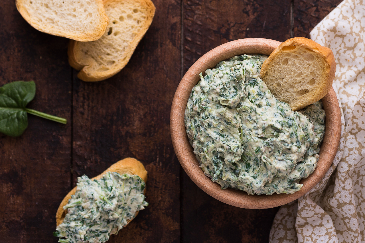 Spinach appetizer with bread - stock photo