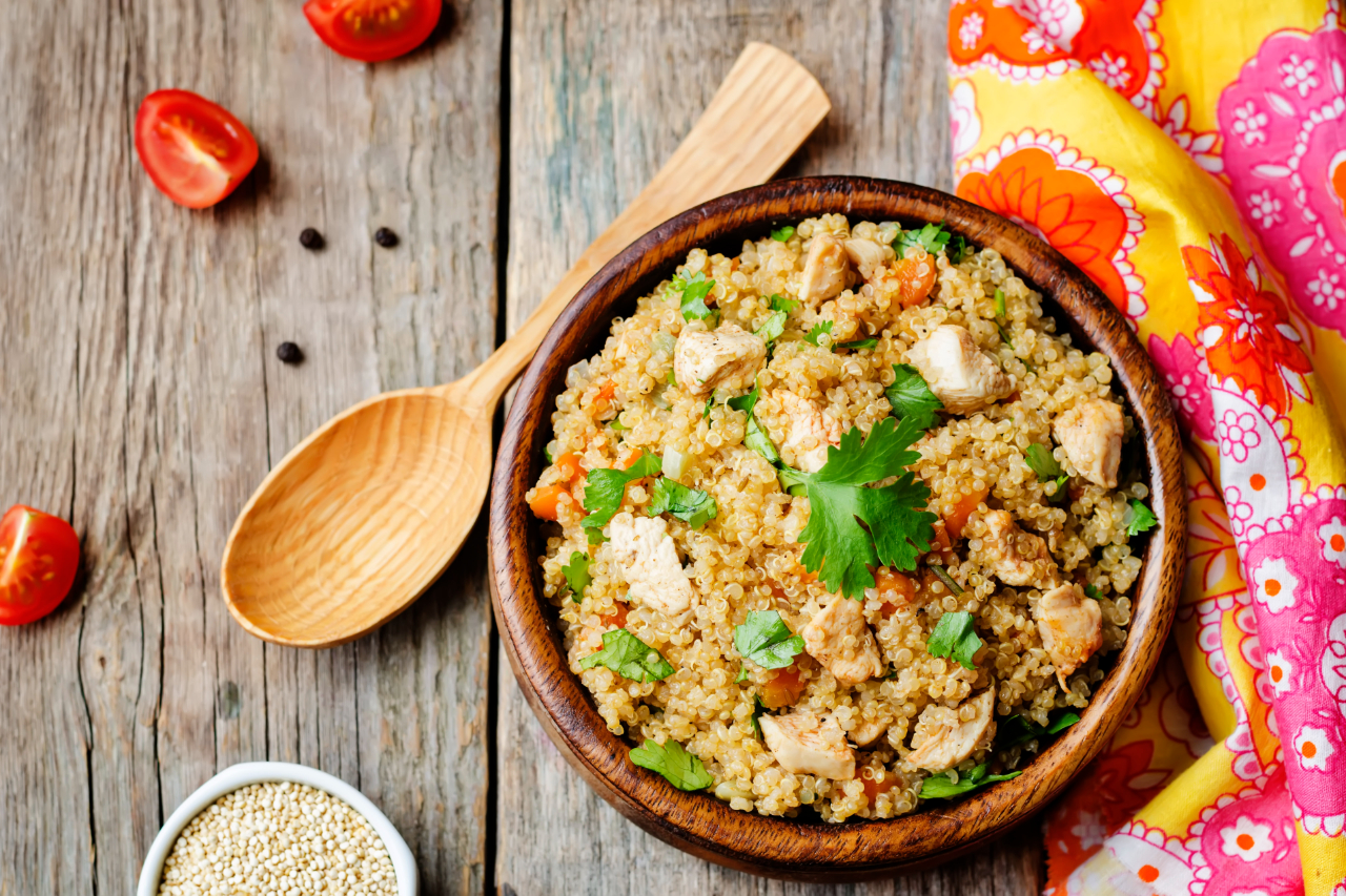 Quinoa pilaf with chicken and vegetables - stock photo