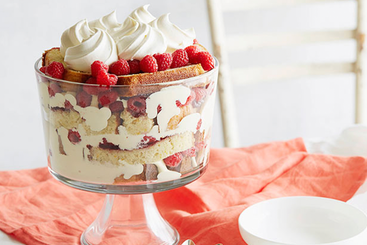 A berry trifle in a clear glass container