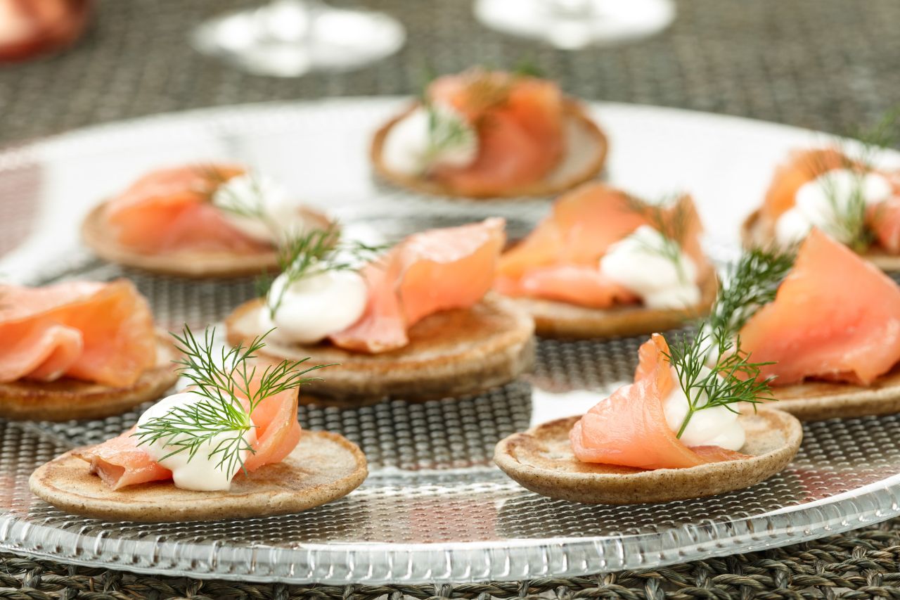 smoked salmon blinis on a platter
