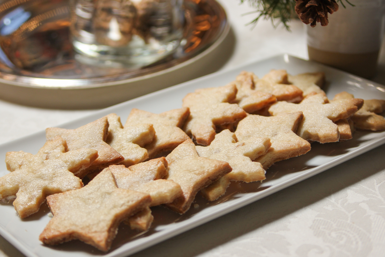 A plate of ginger shortbread cookies shaped like stars