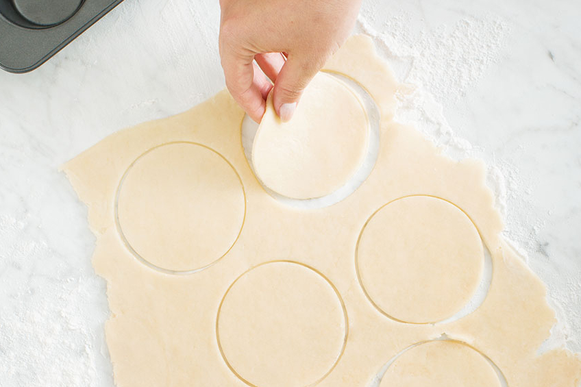 Butter tart pastry being cut into circles