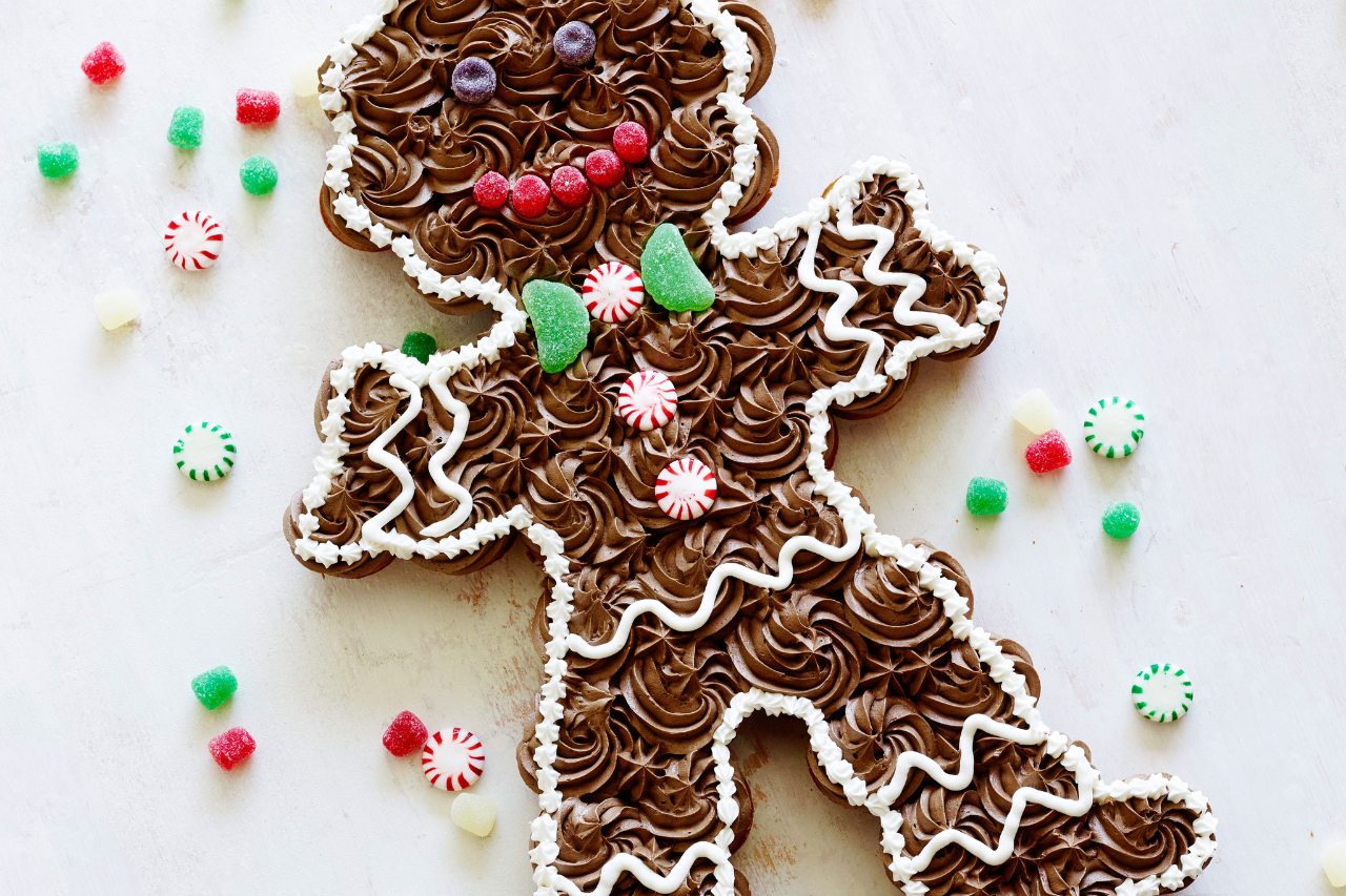 A gingerbread man made of iced cupcakes