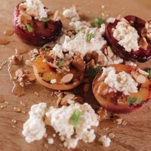 Grilled Stone Fruit with Farmer's Cheese and Spiced Honey Almonds