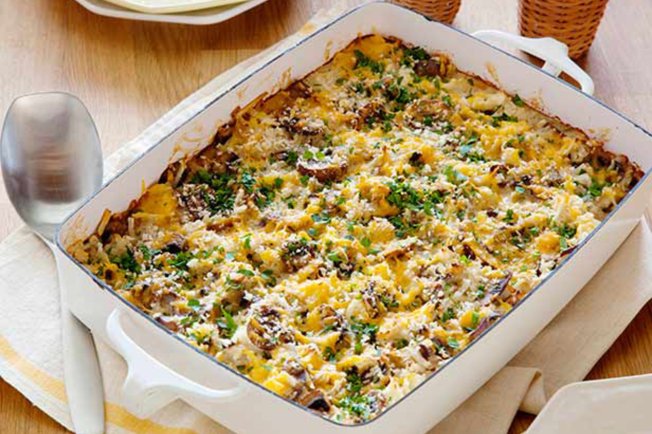 Hash brown casserole in a white baking dish