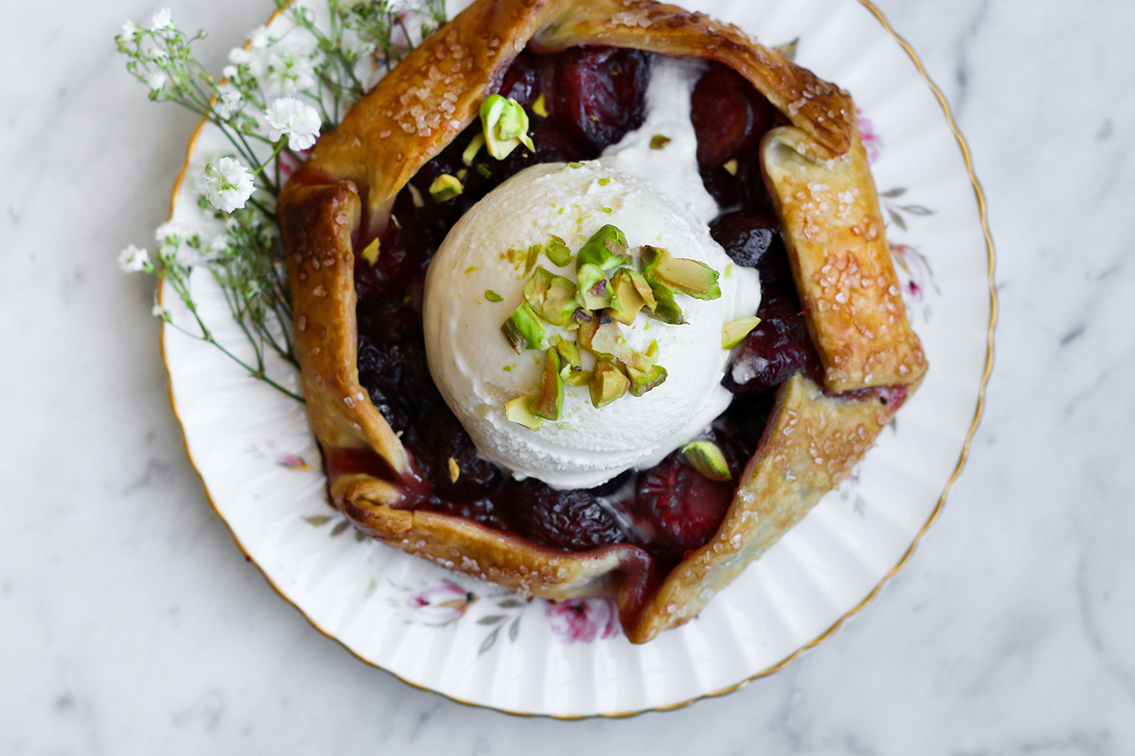 cherry galette with ice cream on a plate