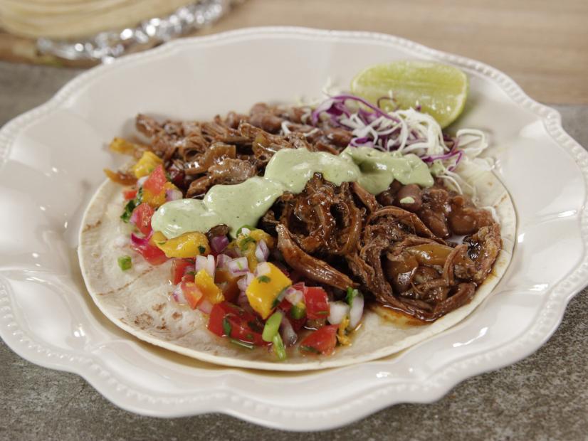 Braised beef brisket on a tortilla with all the classic taco fillings