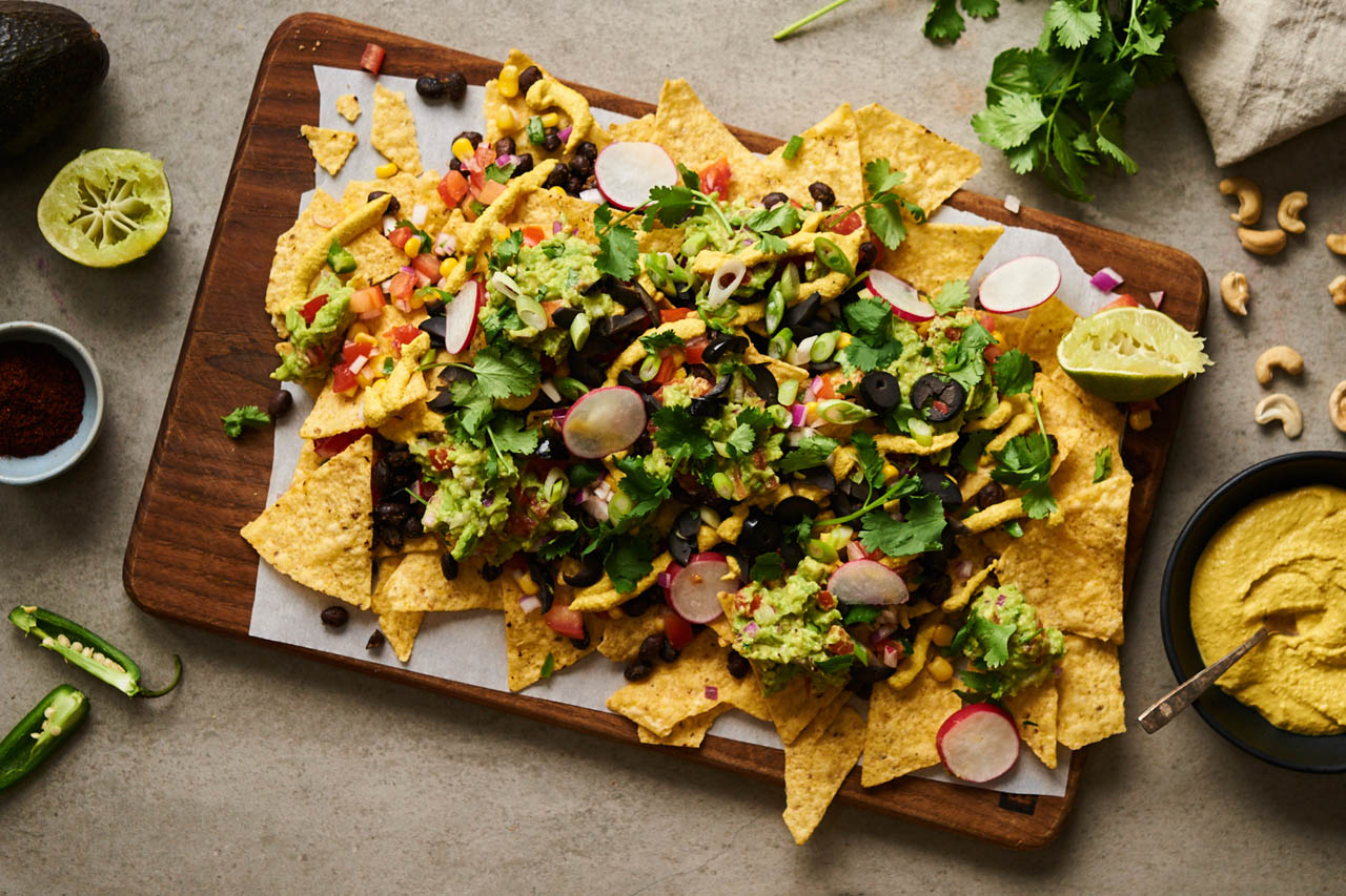 Vegan nachos on a serving board
