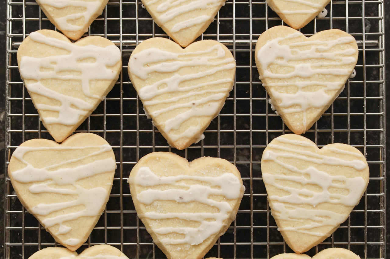 Ina Garten's heart-shaped vanilla shortbread cookies cool on a wire rack