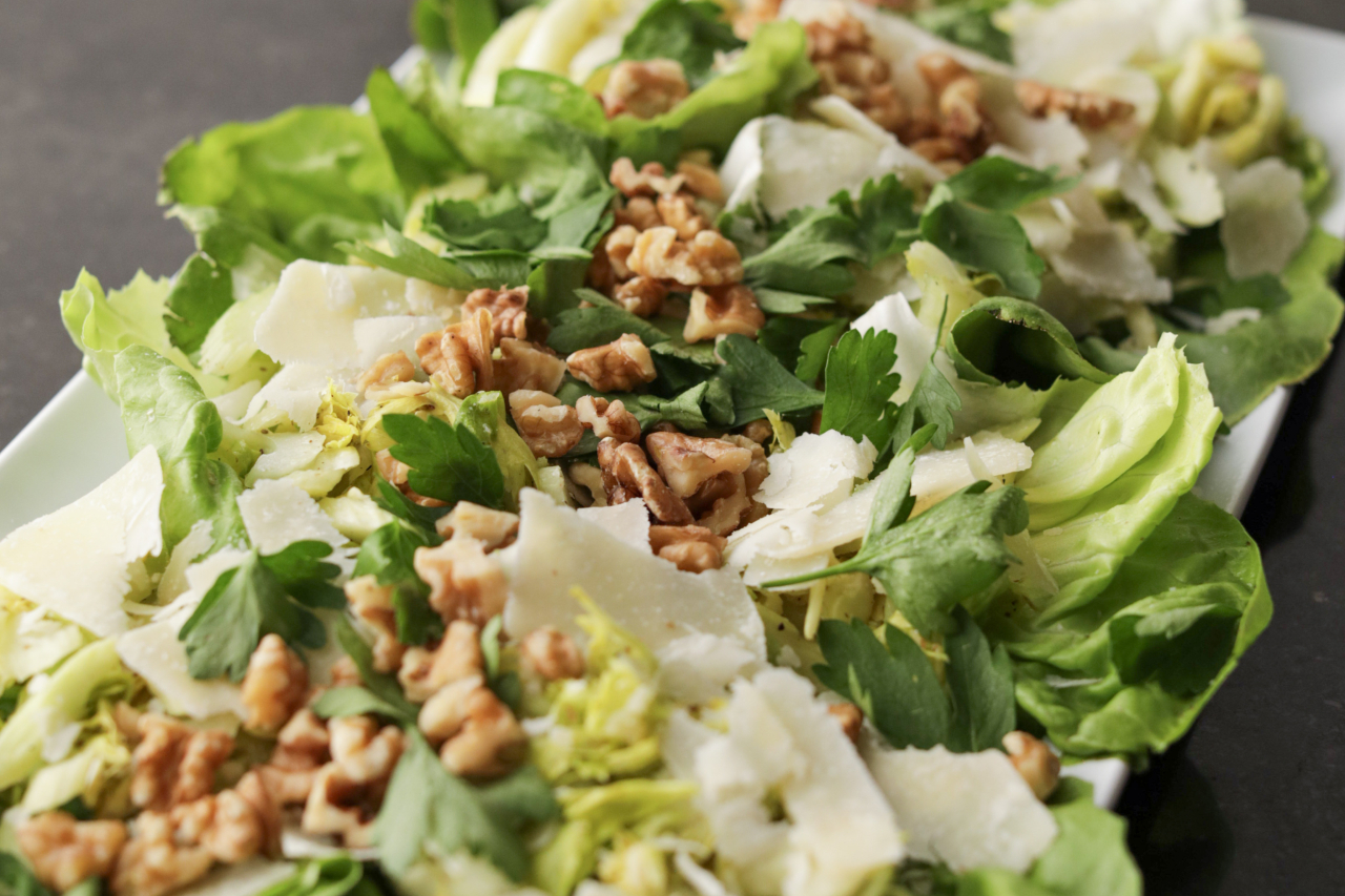A salad with celery and parmesan