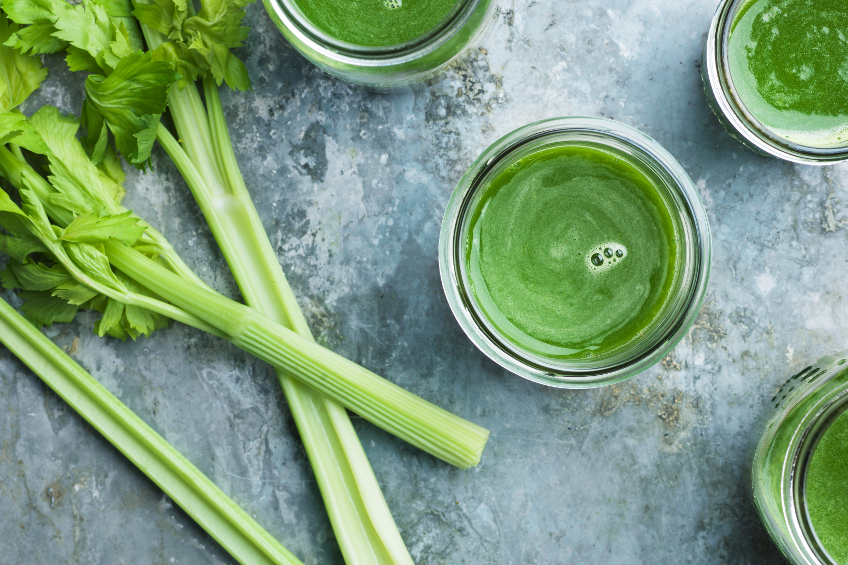 Green celery smoothie - stock photo