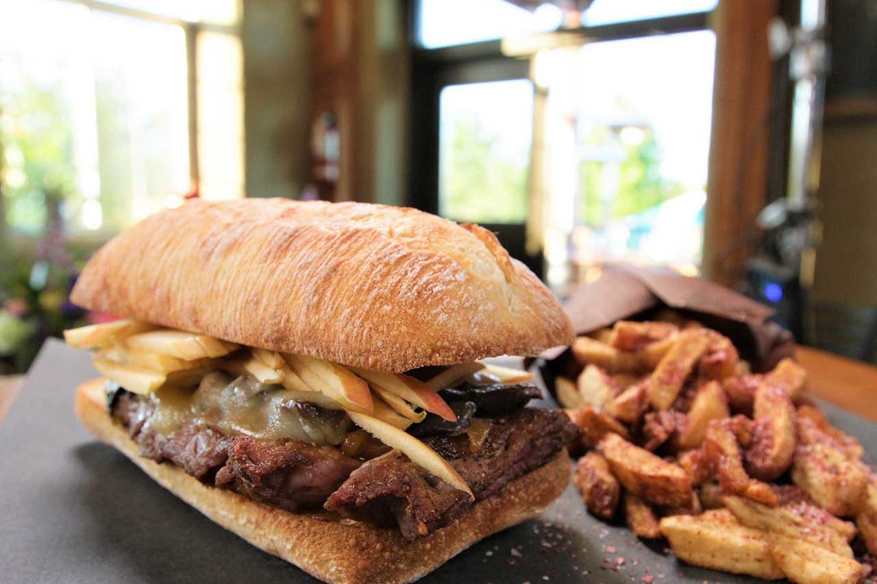 Spirit Tree Estate Cidery's Steak Sandwich with Fries, as seen on Big Food Bucket List.