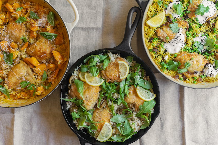 Three pans with chicken thighs and rice in three flavour variations