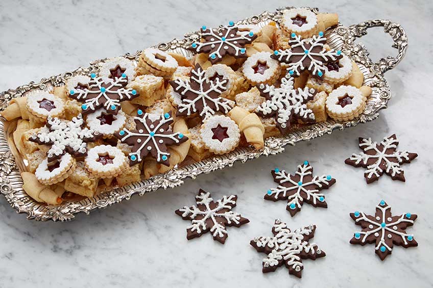 plate of chocolate snowflake cookies