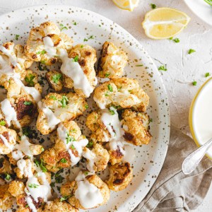 This Middle Eastern Roasted Cauliflower With Tahini is What Vegetarian Dreams Are Made Of