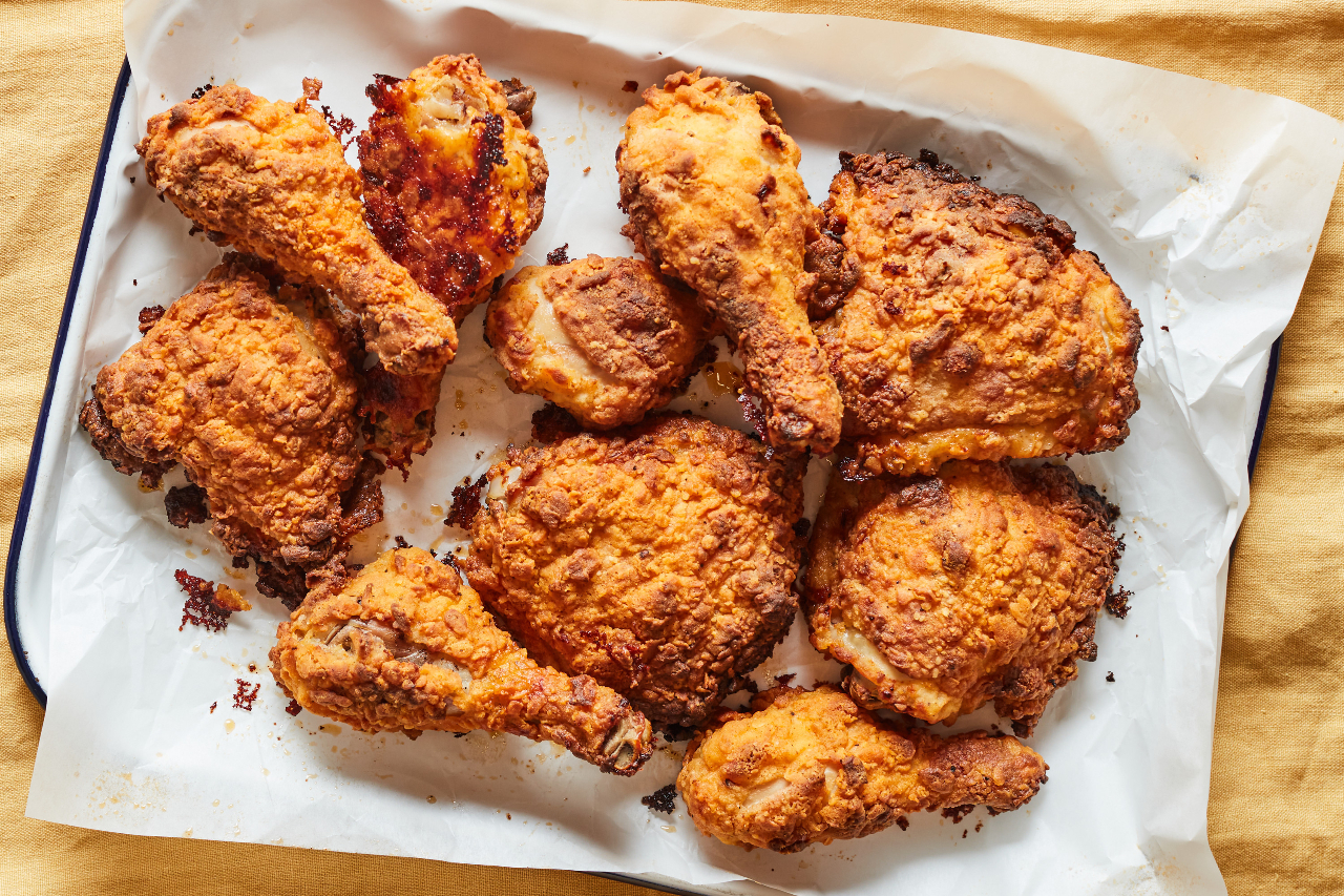 Fried chicken made in an air fryer served on a white platter