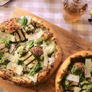 Molly Yeh's Zucchini Pizza With Fresh Pesto Will Be Your New Go-To Pie