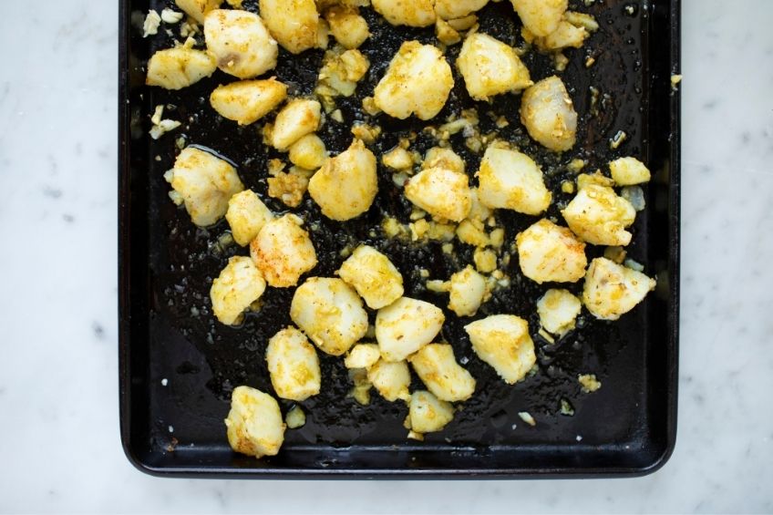 Crispy potatoes on baking tray