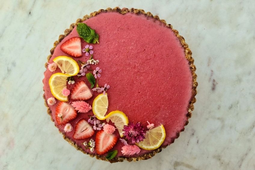 vegan no-bake strawberry lemon tart on countertop