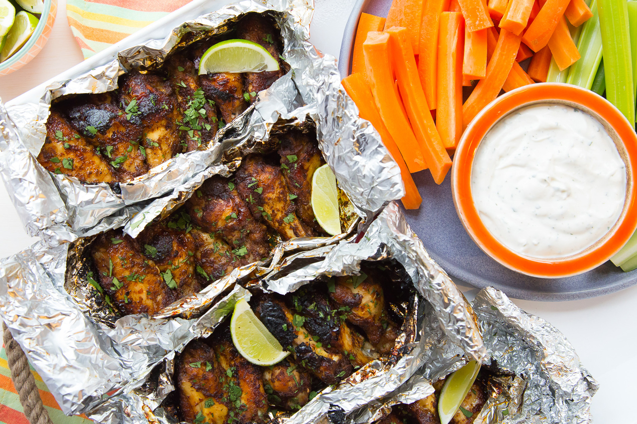 Food Network Kitchen's Foil-Pack Grilled Sweet-and-Spicy Chicken Wings.