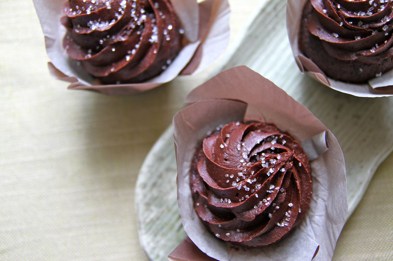 Vegan chocolate cupcakes with piped chocolate frosting