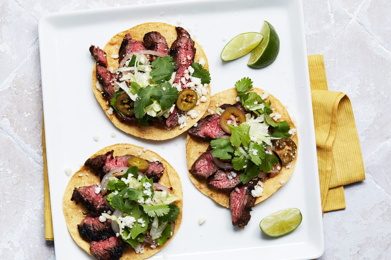 Grilled steak tostadas on a serving tray