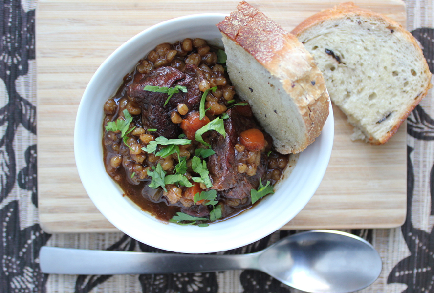 beef and barley stew on a table