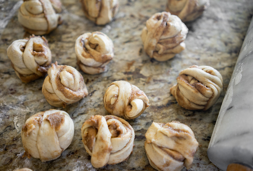 cardamom buns rolled up before being proofed or baked