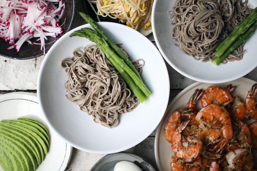 Soba noodles and asparagus spears in a bowl