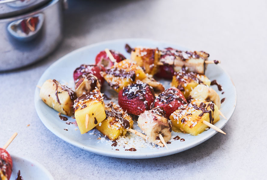 Fruit skewers drizzled with chocolate