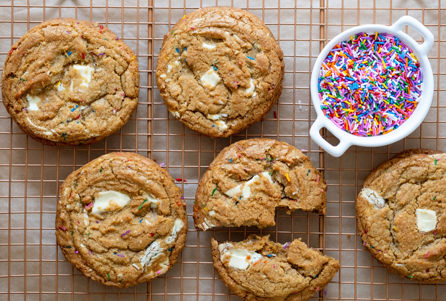 white chocolate funfetti cookies on a cooling rack