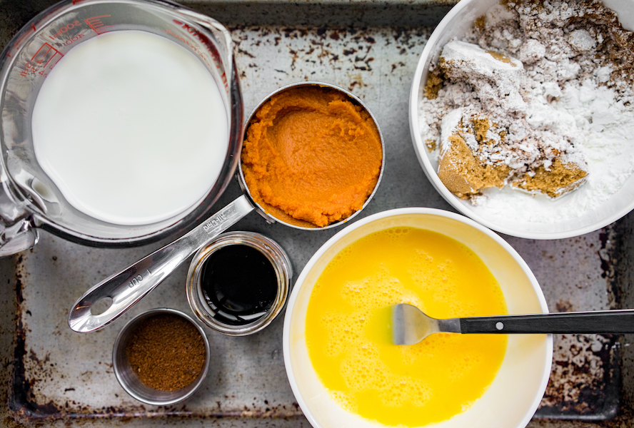 Milk, pumpkin puree, eggs, brown sugar, corn starch and other ingredients for a no-bake pie