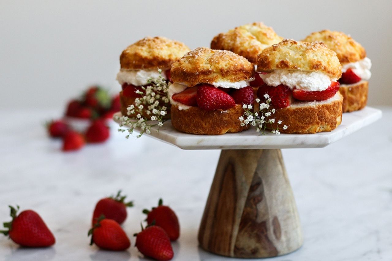 Strawberry shortcakes on a cake tray