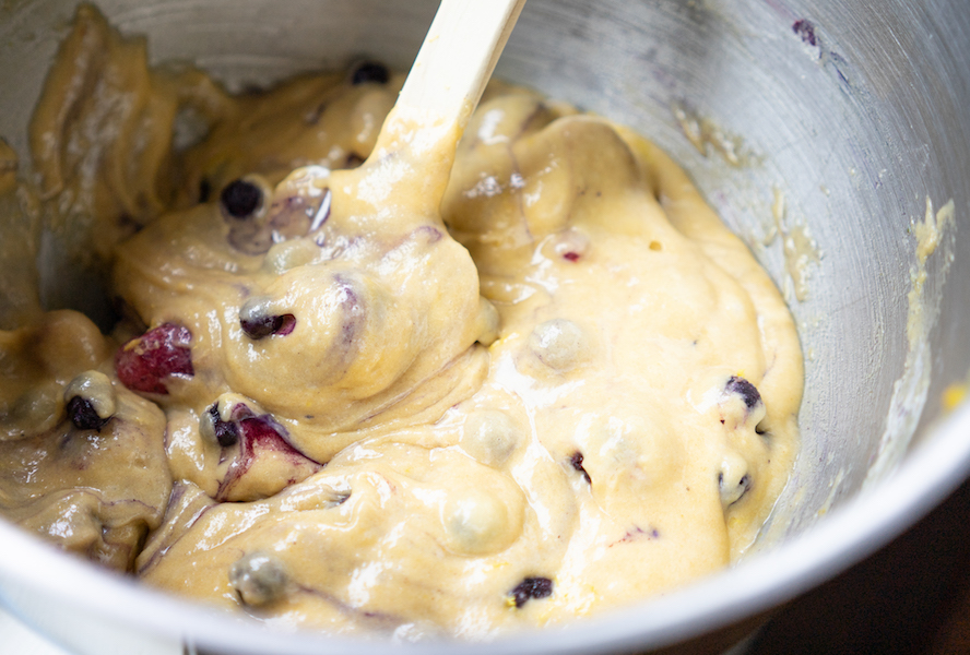 Mixing ingredients for dairy-free summer berry, lemon and tahini pound cake