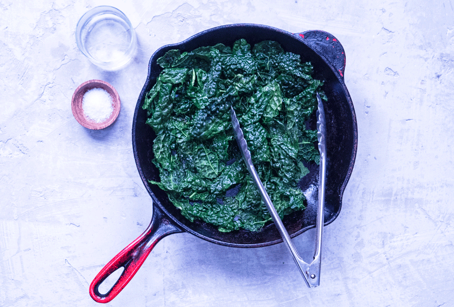 kale in a cast iron skillet