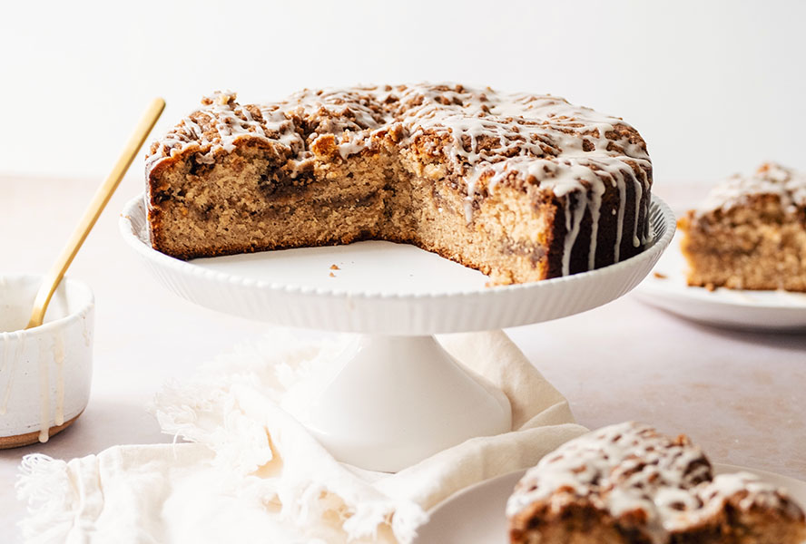 Apple cider coffee cake on white tray
