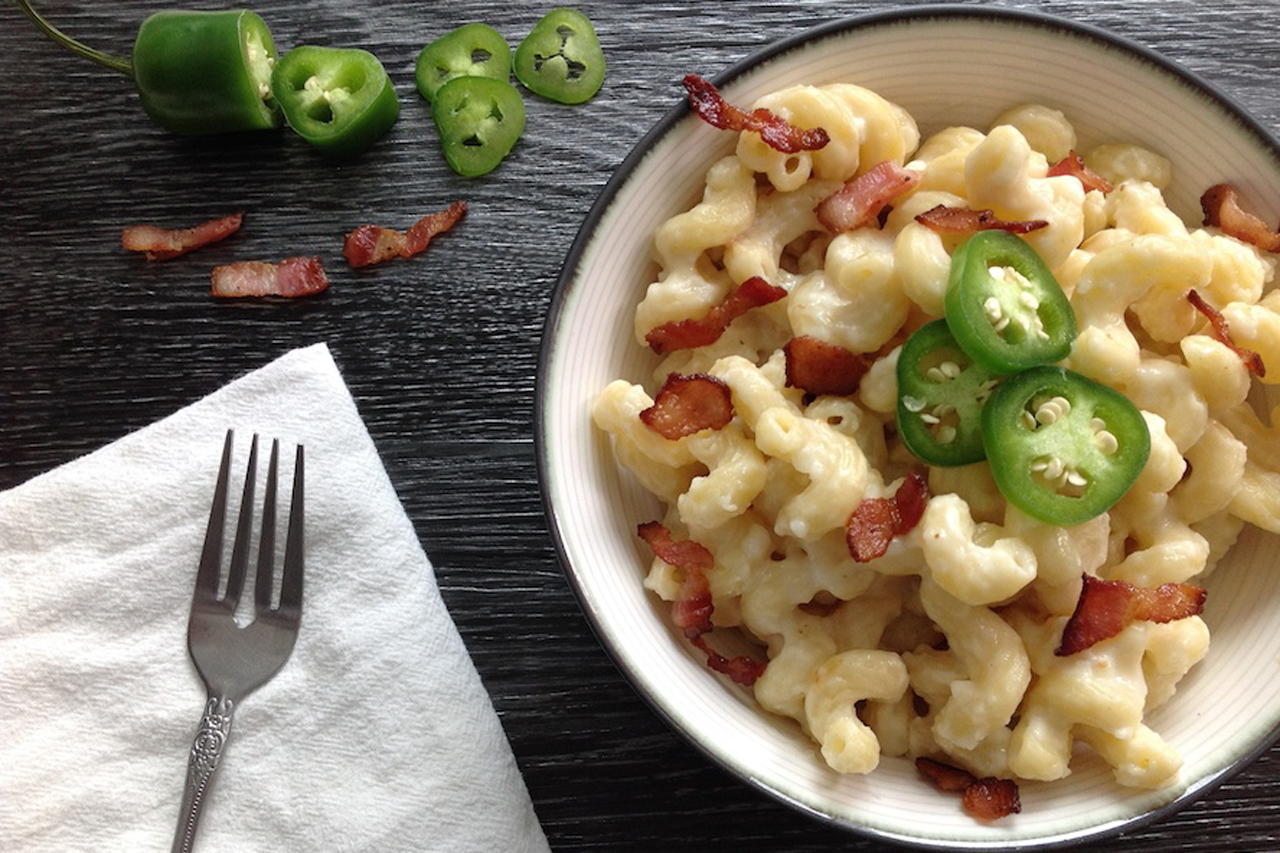 overhead beauty shot of creamy stovetop macaroni and cheese with bacon and jalapeno