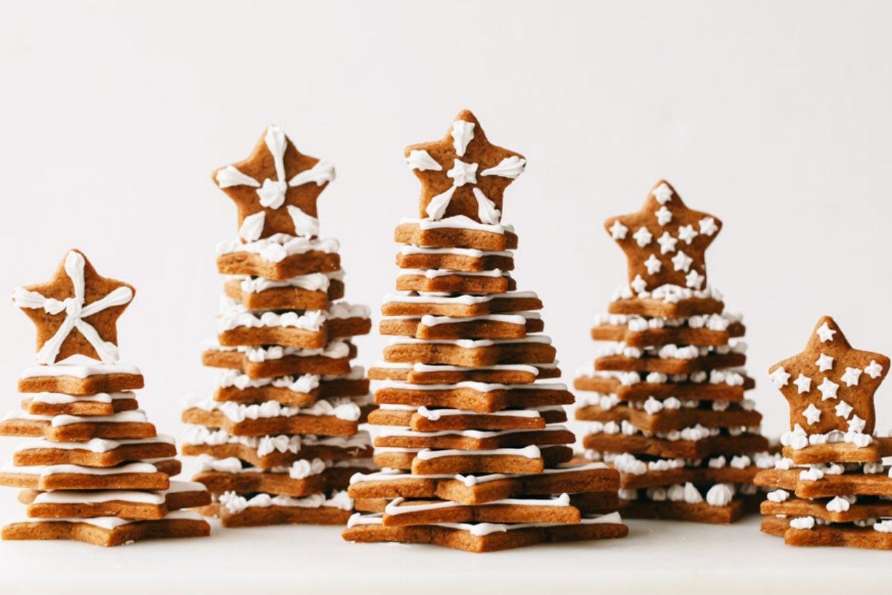 4 stacks of Christmas tree gingerbread cookies