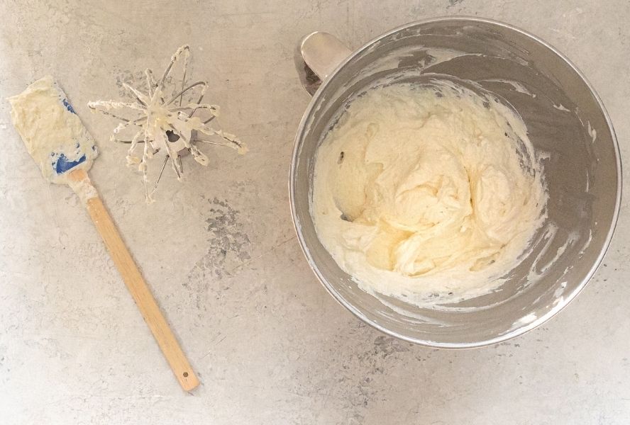confetti cake icing in mixing bowl