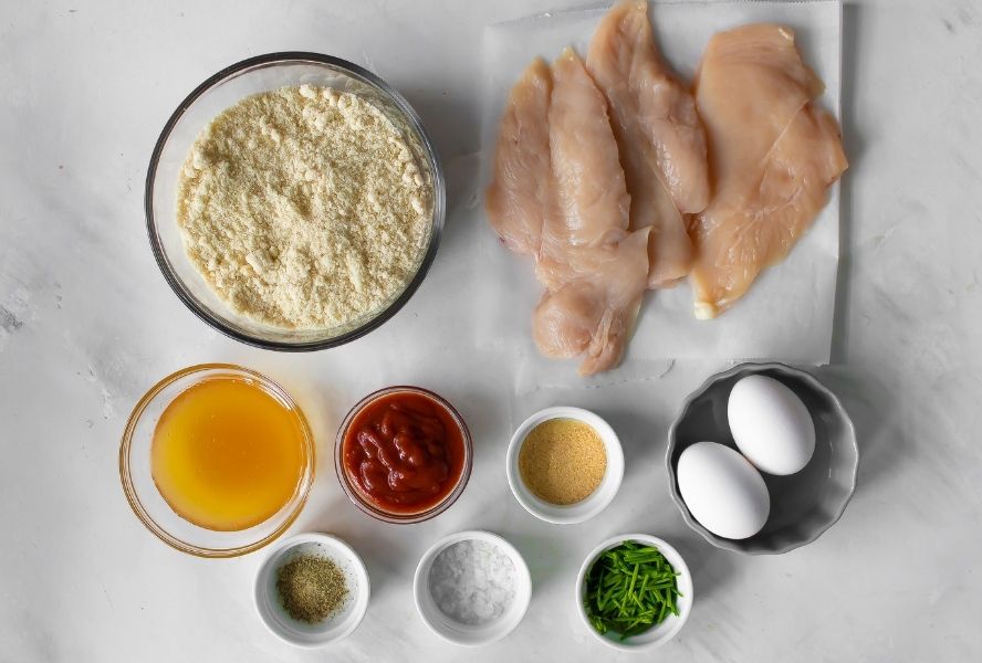 Ingredients for healthy fried chicken on countertop