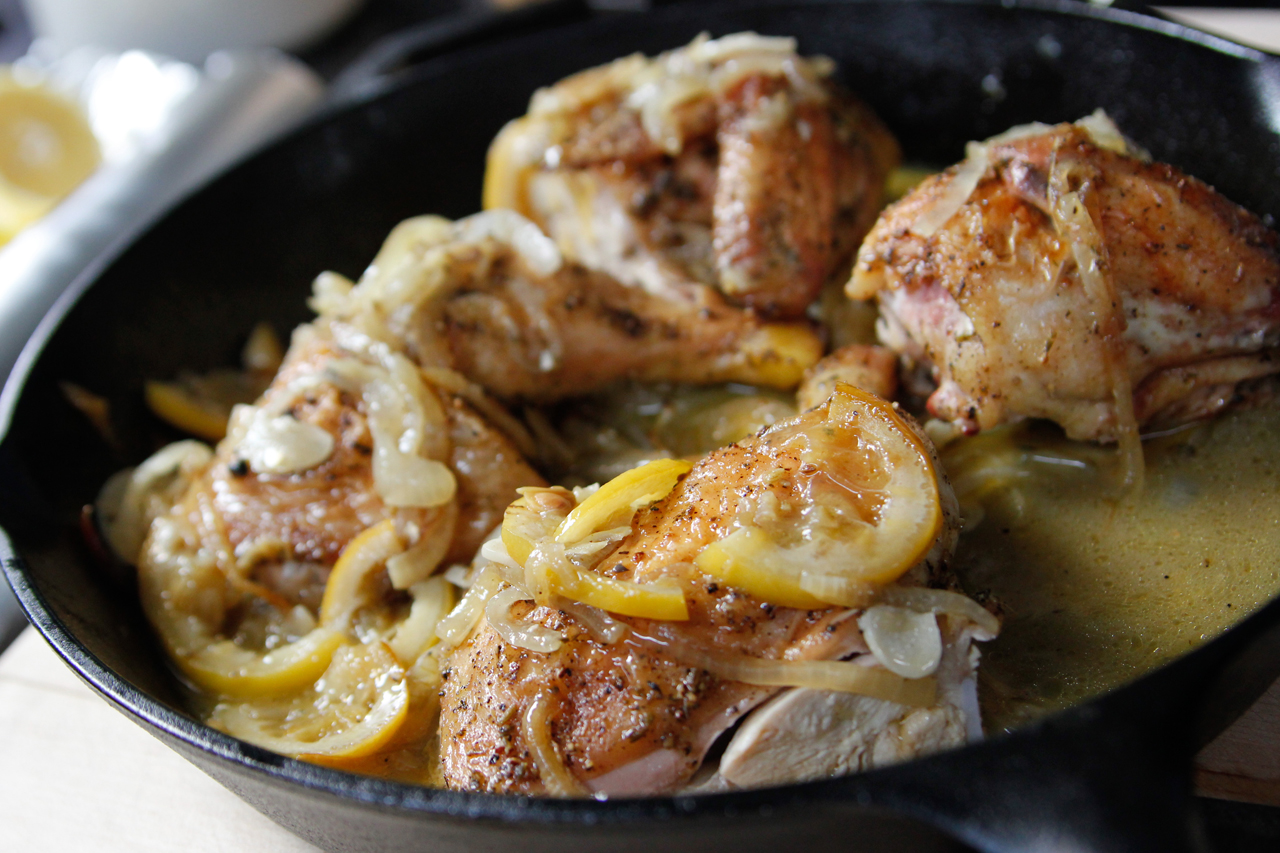 Ina Garten's skillet kitchen in a cast iron pan with lemon slices