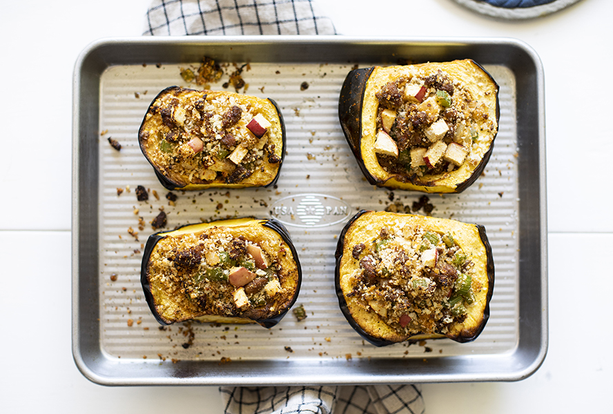 baked stuffed squash on a pan