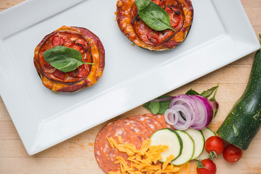 Mini Zucchini Pizzas with Pepperoni on a Plate