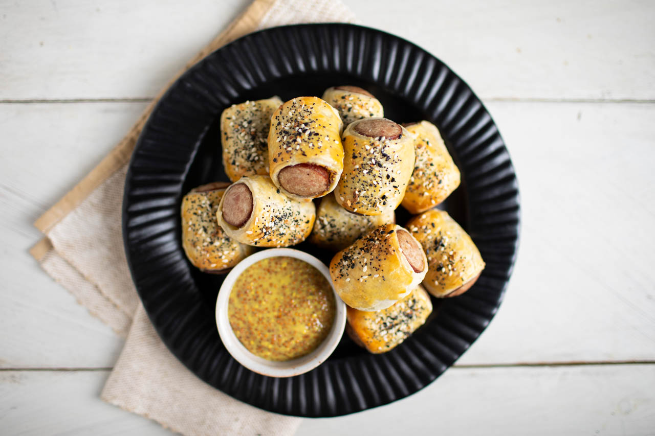 everything bagel sausage rolls with a side of mustard