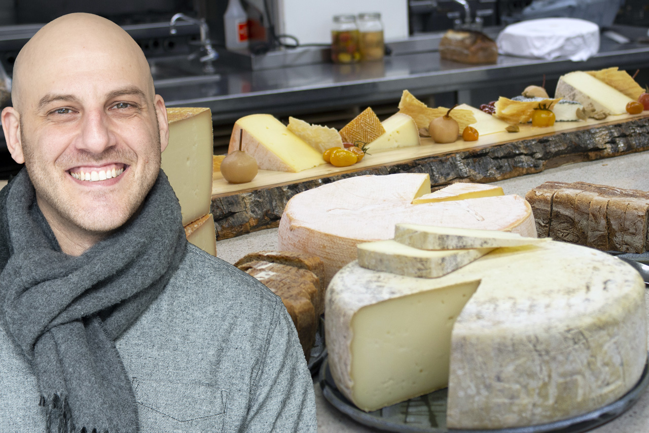 Headshot of Afrim Pristine over various cheeses