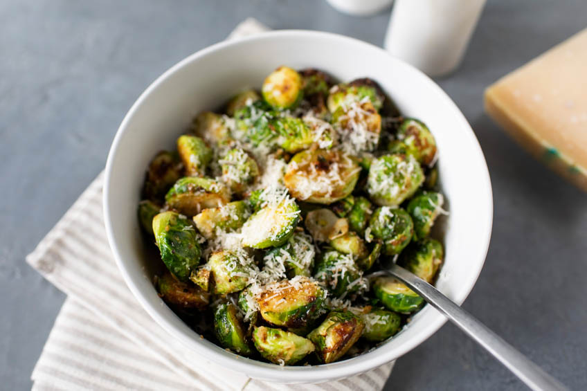 A bowl of crispy Parmesan Brussels sprouts