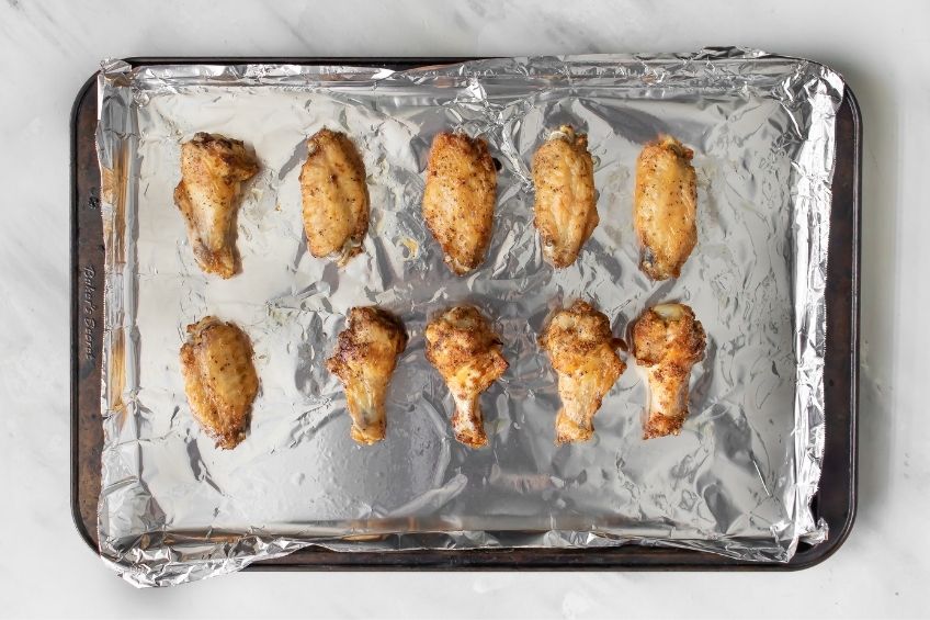sweet chili chicken wings on baking tray